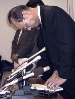 Ishikawa Bank president bows at news conference